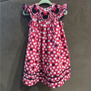 Minnie Mouse smocked dress, size 18 months but fits big.